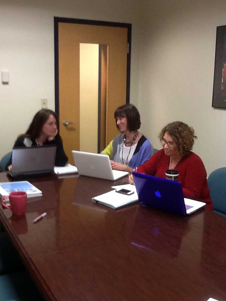 Hampton core team in a planning meeting - Noel Woolard, Holly Whittenburg, and Kelly Siegel