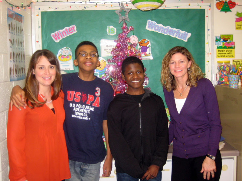 Students from Ashley Gibaud's classroom with ACE team members Noel Woolard (left)
and Dawn Hendricks (right). Ms. Gibaud is the Lancaster/NNRSEP ACE division coach
