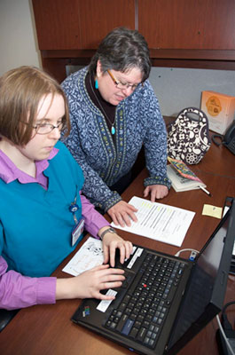 researchers working on a computer