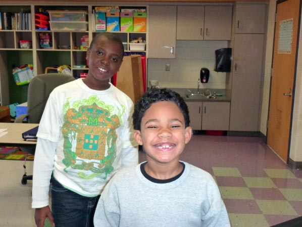 two male students in a classroom